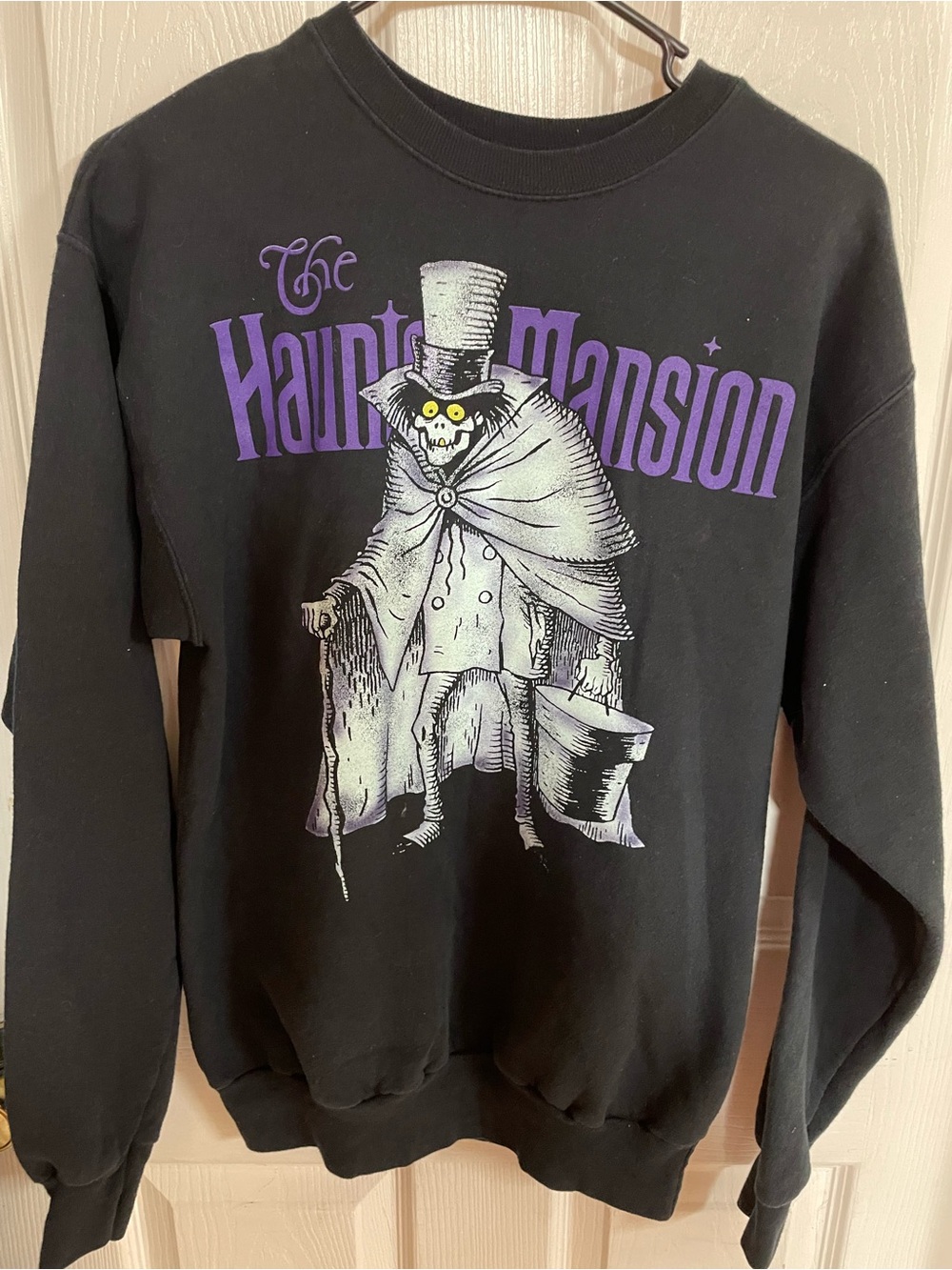 Disney Black Crewneck Sweatshirt with Purple Haunted Mansion Graphic